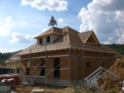 Einfamilienhaus, Holzrahmenwände mit THD Putzplatten, Zeltdach mit verschiedenen Gaubentypen